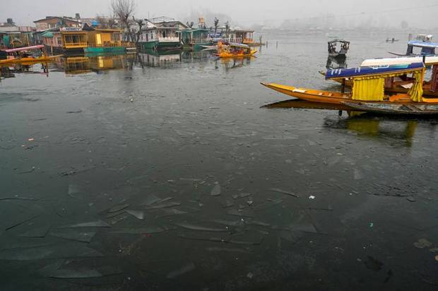 Partially frozen Dal Lake, in Srinagar on Tuesday, December. 24, 2024. (Photo source: PTI)