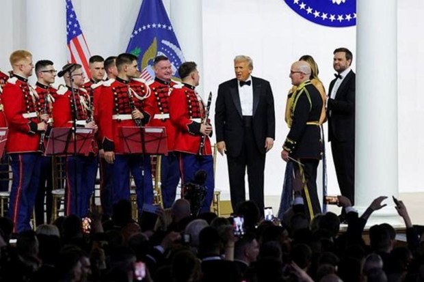 U.S. President Donald Trump, first lady Melania Trump, U.S. Vice President JD Vance and his wife Usha Vance attend the Commander in Chief Ball in honor of Trump's inauguration in Washington, U.S., January 20, 2025. REUTERS/Daniel Cole.