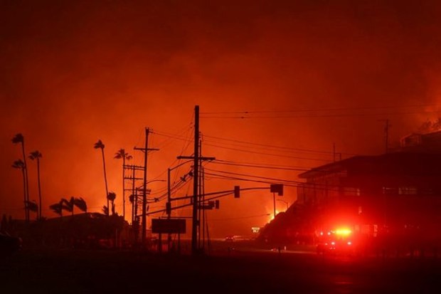 Vehicles travel along the Pacific Coast Highway as a wildfire rages in the Pacific Palisades neighborhood of west Los Angeles, California, on January 7, 2025. (Image Source: Reuters)