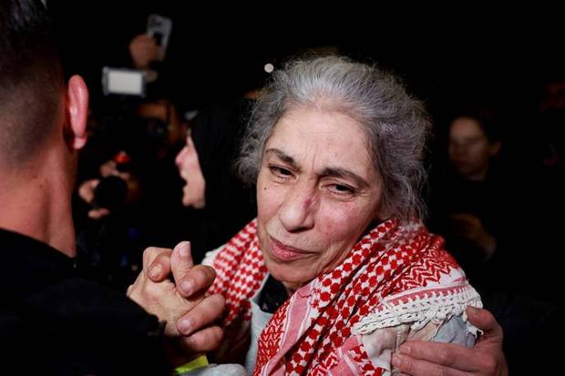 Khaleda Jarar, a freed Palestinian prisoner, is greeted after her release from an Israeli jail as part of a hostages-prisoners swap and a ceasefire deal in Gaza between Hamas and Israel, in Ramallah, in the Israeli-occupied West Bank, January 20, 2025. (Photo source: Reuters)