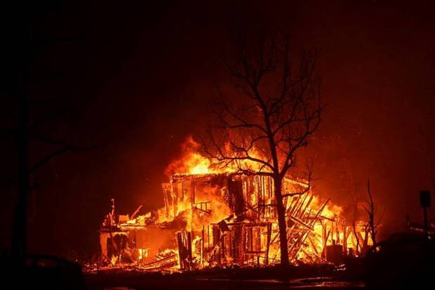 Flames engulf a structure as the Eaton Fire burns in Pasadena, California, U.S. January 7, 2025. (Photo source: Reuters)