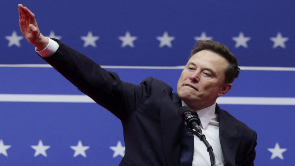 SpaceX CEO Elon Musk gestures during a rally on the inauguration day of U.S. President Donald Trump's second Presidential term, inside Capital One, in Washington, U.S. January 20, 2025. REUTERS/Mike Segar