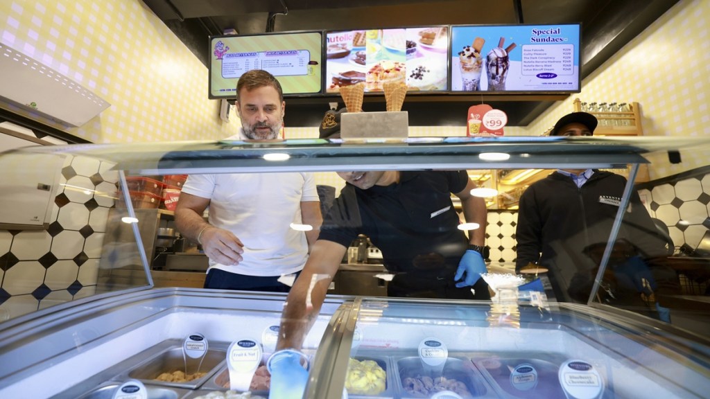 Congress leader and Leader of Opposition in Lok Sabha Rahul Gandhi is seen at a Keventers outlet, at Patel Nagar area, in New Delhi. (AICC via PTI Photo)