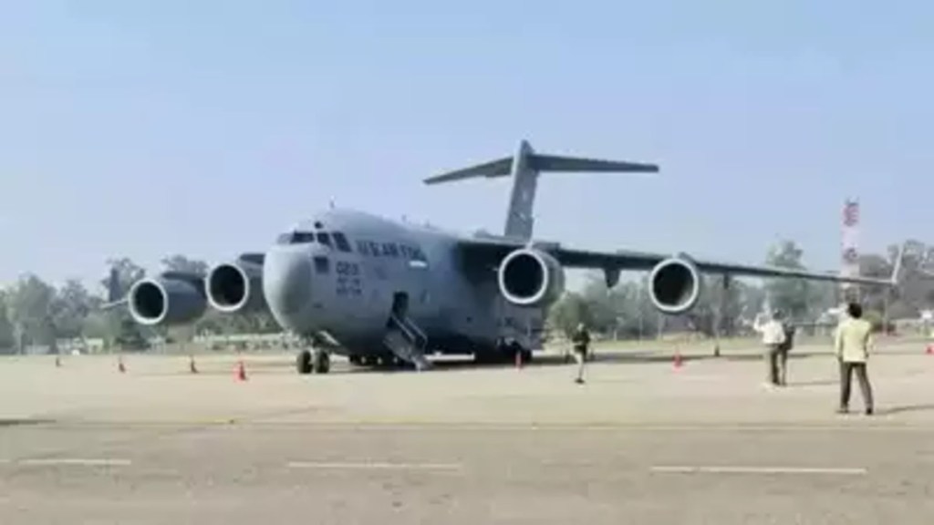 Plane carrying second batch of 116 deportees from US lands in Amritsar . (Image Source: PTI)