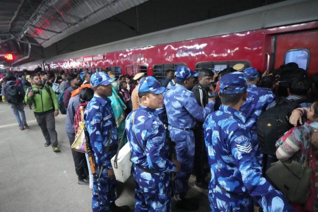 To diffuse the crowd and manage the situation at hand, security personnel were promptly deployed to help the passengers to safety. (Image: PTI)