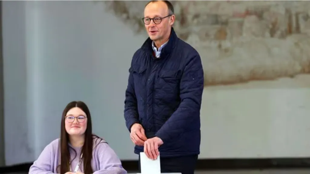 Friedrich Merz, CDU leader, votes at a polling station in Arnsberg-Niedereimer, Germany, on Feb. 23, 2025. (Image Source: AP)