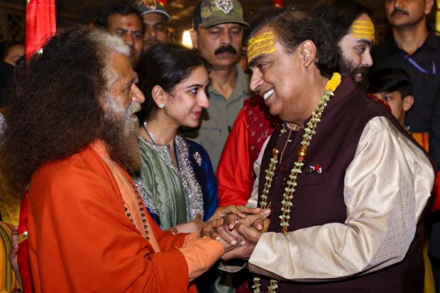 On the eve of the Maghi Purnima, Anant Ambani with father, Mukesh Ambani were also seen taking a dip in the Triveni Sangam. They were accompanied by their entire immediate family. (Image: PTI)