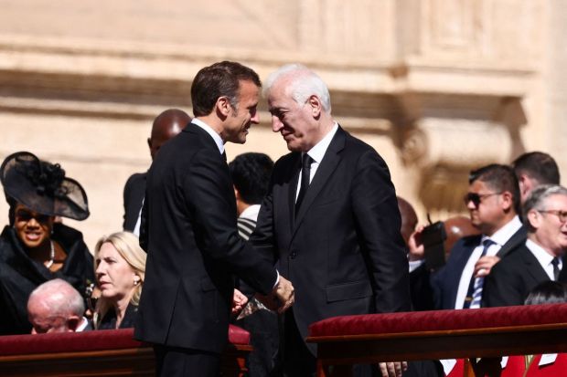 French President Emmanuel Macron was seen shaking hands with Armenian President Vahagn Khachaturyan. After the ceremony he also shook hands with Trump and Zelensky. (Image: Reuters)
