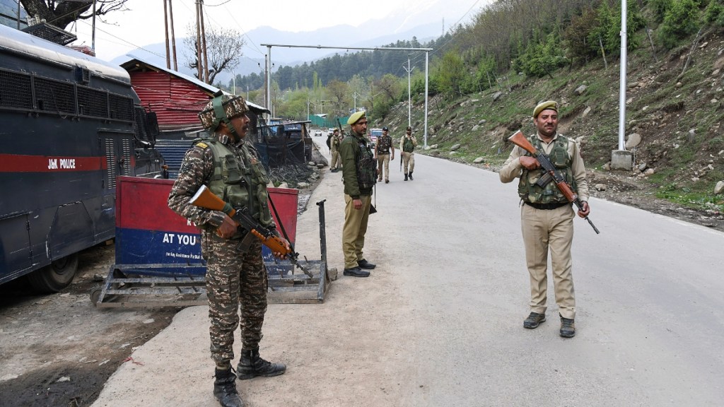 Security personnel stand guard at the site of the incident after terrorists attacked tourists in Pahalgam, Jammu and Kashmir, on Tuesday. (ANI Photo)
