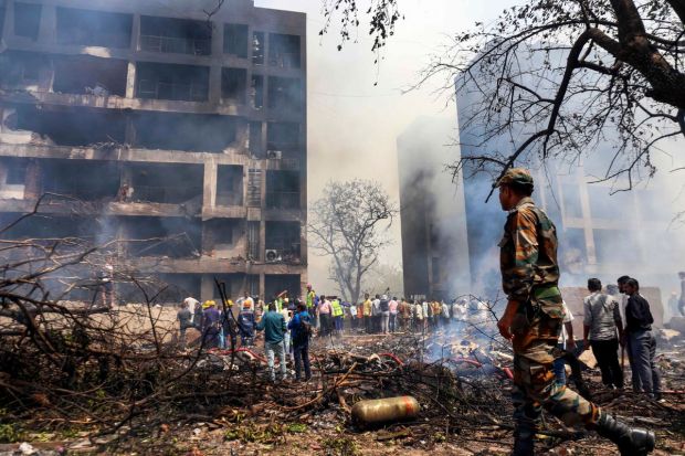 Emergency response teams, including firefighters, medical staff, and CISF personnel, reached the site quickly. Rescue operations began immediately to locate survivors and provide medical aid. (Image Source: PTI) 