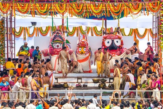 As seen in this image released by @JagannathaDhaam/X, servitors are performing the Snan Purnima rituals for Lord Jagannath, Balabhadra, and Devi Subhadra on the Snan Bedi at the Jagannath Temple in Puri, on Wednesday, June 11, 2025. (Image Source: PTI)