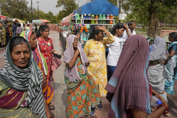 Red Alert in Delhi: The IMD had issued a red alert in Delhi due to a spike in humidity level which led to soaring temperature in the national capital. The 'feel-like' temperature was at 50 degree Celsius. (Photo Source - AP)