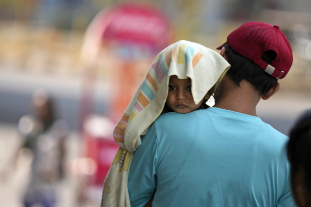 The temperatures have soared above 40 degree Celsius across North India this week. People have been experiencing extreme discomfort which has also put a dampener on their travel plans. (Photo Source - AP)