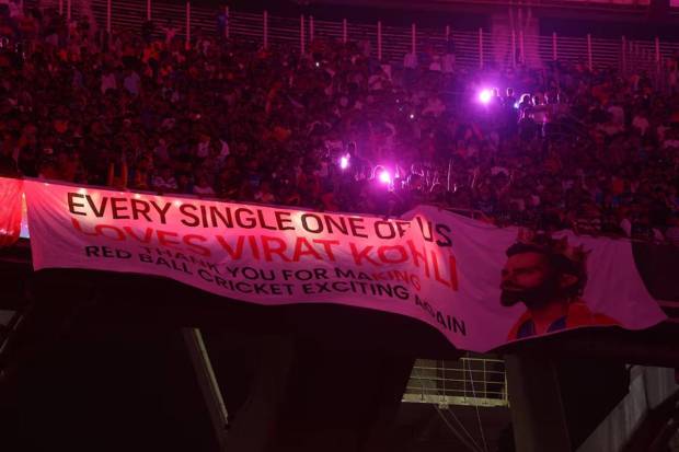 Royal Challengers Bengaluru fans display a banner with an image of Virat Kohli after Royal Challengers Bengaluru won the Indian Premier League. (Photo source: Reuters) 