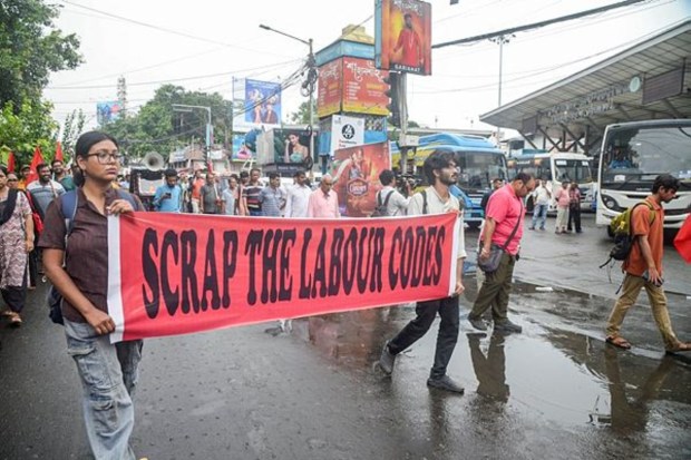 In Kolkata on Wednesday, Left Front party supporters marched in a rally during the 'Bharat Bandh' (nationwide general strike) called by a forum of 10 central trade unions and their associates. (Image Source: ANI)