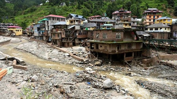 Debris and silt near damaged houses at a flood-affected area, in Mandi district, Sunday, July 6, 2025. Fourteen people have died, and a search is on for 31 missing, as cloudbursts, flash floods, and landslides caused massive destruction in Himachal Pradesh. (PTI Photo)