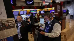 Wall Street opens lower as inflation report fuels rate cut bets