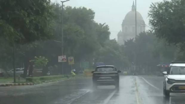 Rain lashes parts of Delhi-NCR; visuals from Pandit Pant Marg. (Photo source: ANI)