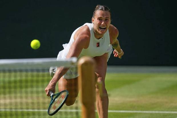 Aryna Sabalenka of Belarus returns to Amanda Anisimova of the U.S. during a women's singles semifinal match at the Wimbledon Tennis Championships in London. (Photo source: AP)
