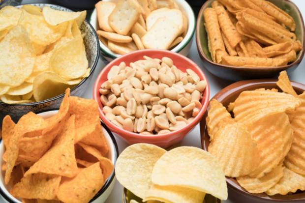 A strong urge for salty snacks may point to an imbalance of sodium or potassium. (Photo source: Canva)