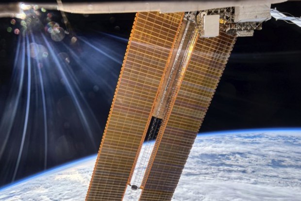 A striking image of a satellite orbiting Earth, captured from the vantage point of the International Space Station, showcasing the intricate dance of technology and exploration high above our planet. (Image source: Peggy Whitson, Axiom Space astronaut )