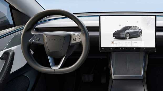Inside, the Model Y keeps it simple with a large infotainment system taking care of all the controls.