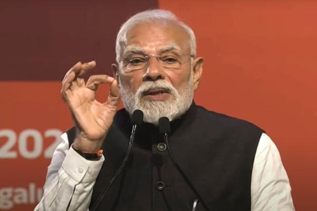 Prime Minister Narendra Modi addresses the gathering during an event to lay the foundation stone of development projects and the inauguration of the Yellow Line of Namma Metro in Bengaluru. (Image Source: PTI)