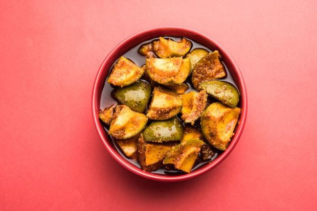 Mango Pickle: An accompanying element in the Onam thali, this pickle adds a touch of spice and sour to the meal and is best paired with rice and sambhar. (Image: Canva)