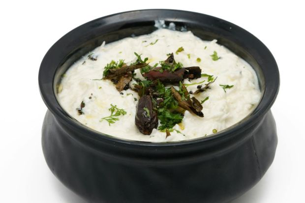 Pachadi: A sweet and tangy dish, this yoghurt-based dish features cucumber with hints of mustard and coconut. It is the perfect contrast to spicy dishes on the Onam Sadhya thali. (Image: Canva)