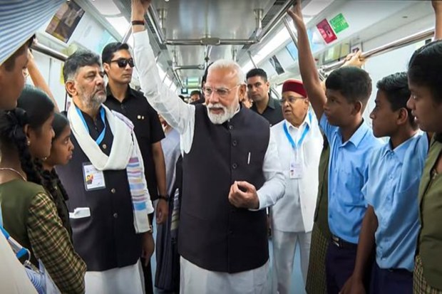 Prime Minister Narendra Modi interacted with students during the flag-off of the Yellow Line of Namma Metro in Bengaluru. Karnataka Governor Thaawar Chand Gehlot and Deputy Chief Minister DK Shivakumar were also present. (Image Source: PTI)