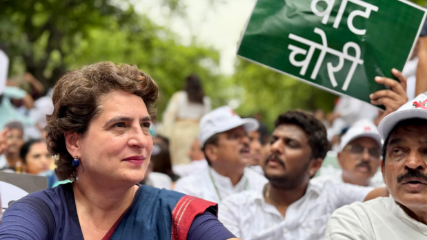 More than 30 MPs, including Congress’s Rahul Gandhi and Priyanka Gandhi Vadra, Shiv Sena (UBT) leader Sanjay Raut and TMC’s Sagarika Ghose, were detained and taken to the Parliament Street Police Station. The Election Commission had only given permission to 30 MPs to enter its premises, but the protesters were in “large numbers”, officials said. (Photo Source: Official Twitter handle @INCIndia)