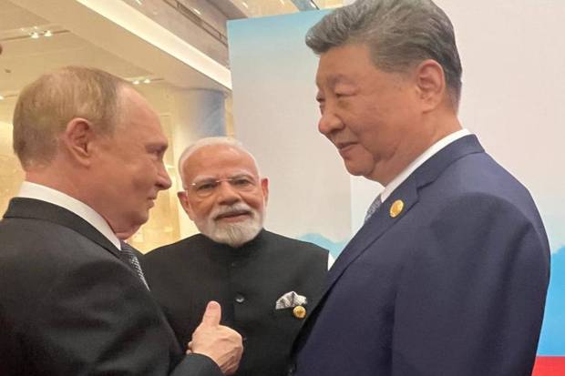 PM Modi, Russian President Putin, and Chinese President Xi Jinping were seen together. (Photo source: IE)