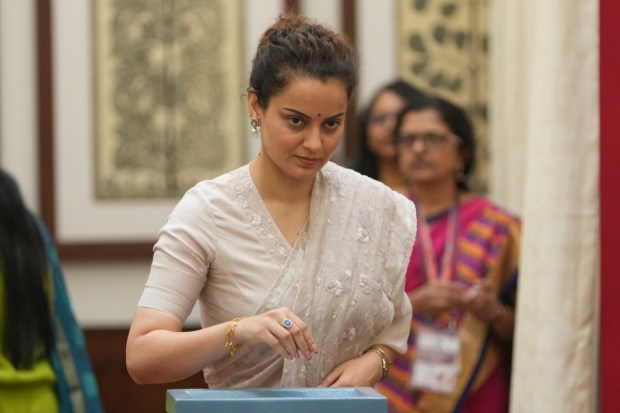 Indian lawmaker and Bollywood actor Kangana Ranaut casts her vote in the vice presidential election at Parliament House. (Image: AP)