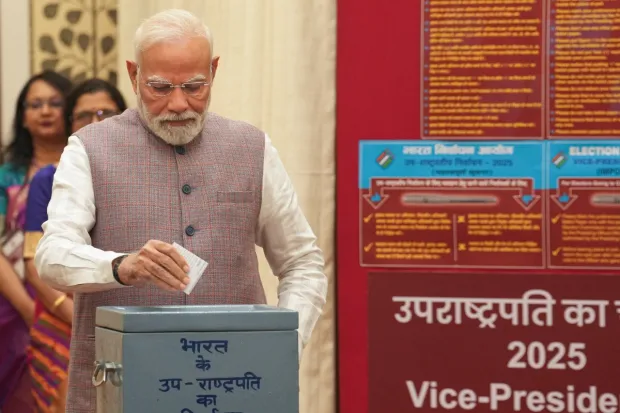 Prime Minister Narendra Modi casts his vote in the vice presidential elections, at the Parliament premises. (Image: PTI)