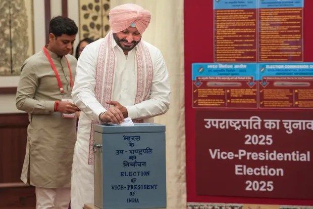 Union Minister of State for Railways and BJP MP Ravneet Singh Bittu casts his vote in the vice presidential elections, at the Parliament premises. (Image: PTI)