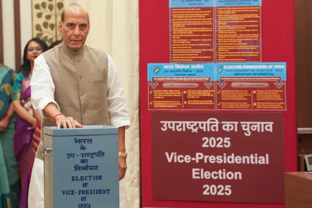 Defence Minister Rajnath Singh casts his vote in the vice presidential elections, at the Parliament premises. (Image: PTI)