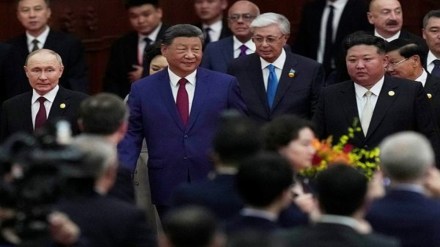 Chinese President Xi Jinping, centre, walks with North Korean leader Kim Jong Un, right, and Russian President Vladimir Putin, left, to a reception following a military parade to commemorate the 80th anniversary of Japan's World War II surrender held in front of Tiananmen Gate in Beijing, Wednesday, Sept. 3, 2025. (AP Photo/Mahesh Kumar)